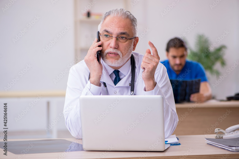 Two doctors working in the clinic Two doctors working in the clinic