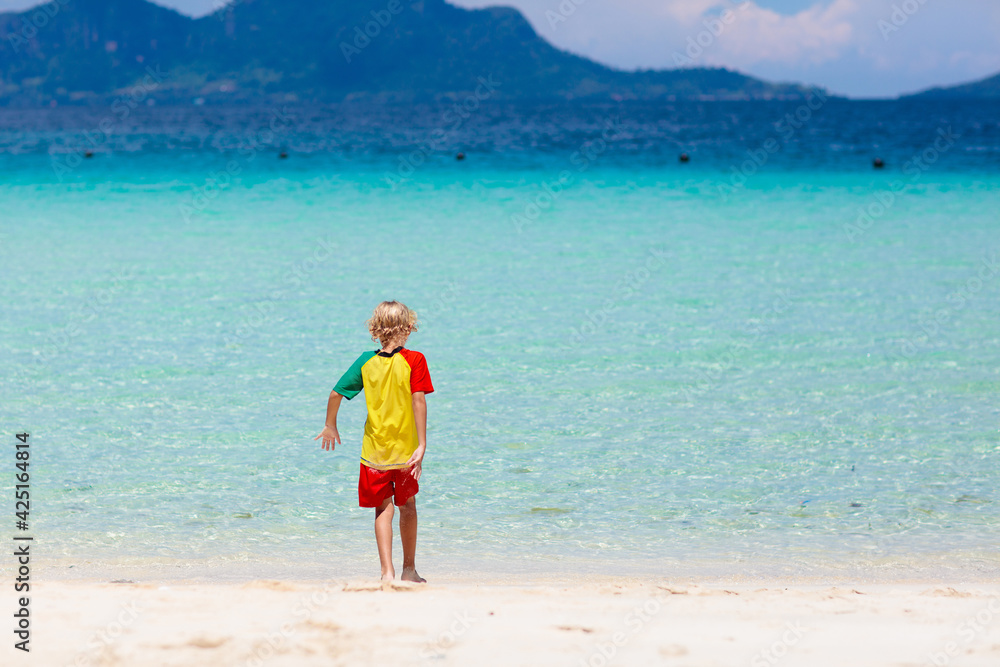 Kids playing on beach. Children play at sea. Kids playing on beach. Children play at sea.