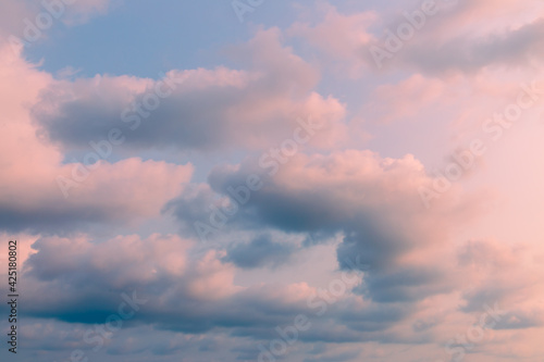 Fototapeta Naklejka Na Ścianę i Meble -  Blue and orange sky background with clouds in summer