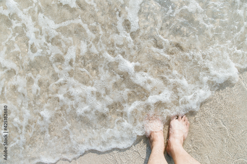 Feet on sea sand , Vacation on ocean beach