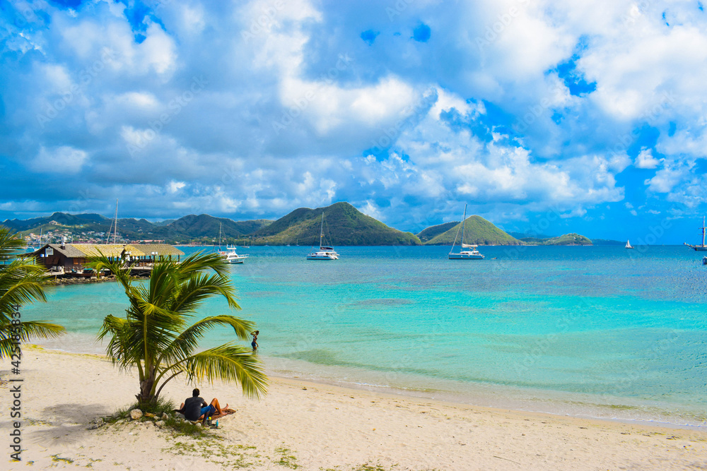 Tropical Beaches and beautiful waves crashing into picture-perfect rocks covered in the embrace of lively moss. Beach swarming with Jetskis and boat/ Cactus overlooking the sea. Tropical Beaches and beautiful waves crashing into picture-perfect rocks covered in the embrace of lively moss. Beach swarming with Jetskis and boat/ Cactus overlooking the sea.