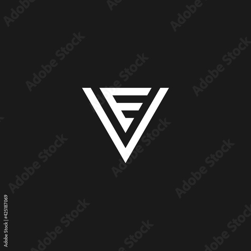 Creative Illustration of modern triangle letter EV