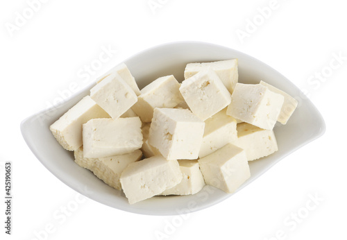 Pieces of delicious tofu on white background, top view. Soybean curd