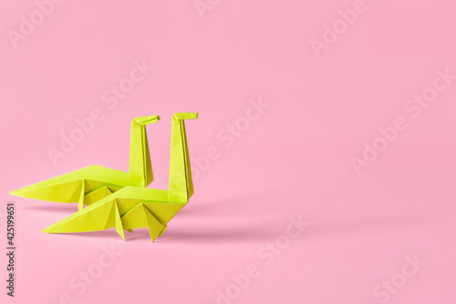 Origami dinosaurs on color ...
