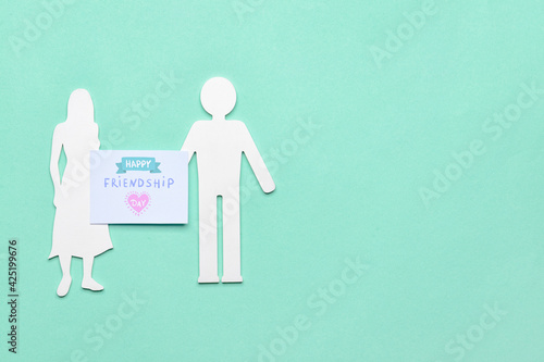 Paper human figures and gre...
