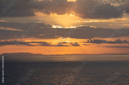 Beautiful colors of a sunset in the pacific ocean in the magical beaches of Costa Rica