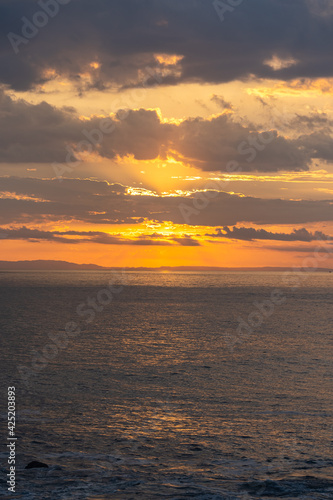 Beautiful colors of a sunset in the pacific ocean in the magical beaches of Costa Rica