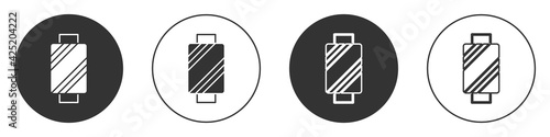 Black Sewing thread on spool icon isolated on white background. Yarn spool. Thread bobbin. Circle button. Vector