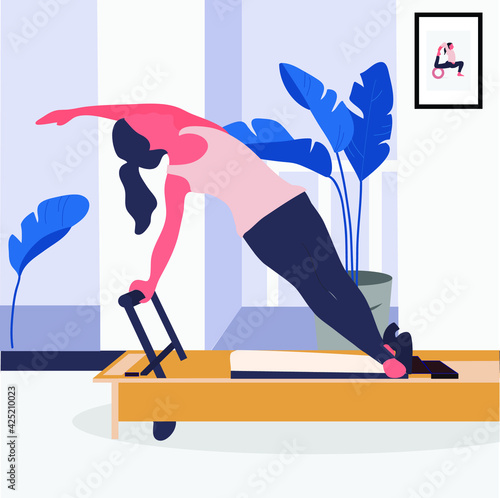 A woman doing pilates with equipment at home - a concept illustration of active lifestyle