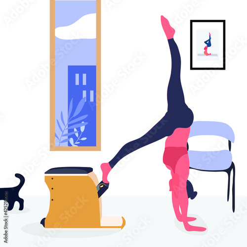 A woman doing pilates with equipment at home - a concept illustration of active lifestyle