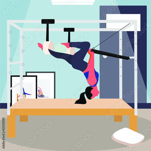 A woman doing pilates with equipment at home - a concept illustration of active lifestyle