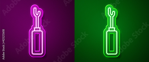 Glowing neon line Awl tool with wooden handle icon isolated on purple and green background. Work equipment tailor industry. Vector