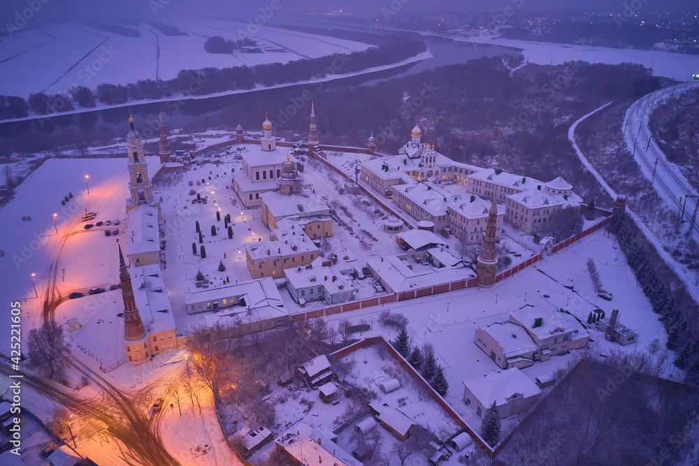 Scenic aerial view of Old Golutvin Monastery in old small russian town Kolomna. Beautiful winter snowy look of old orthodox monastery in ancient historic russian town
