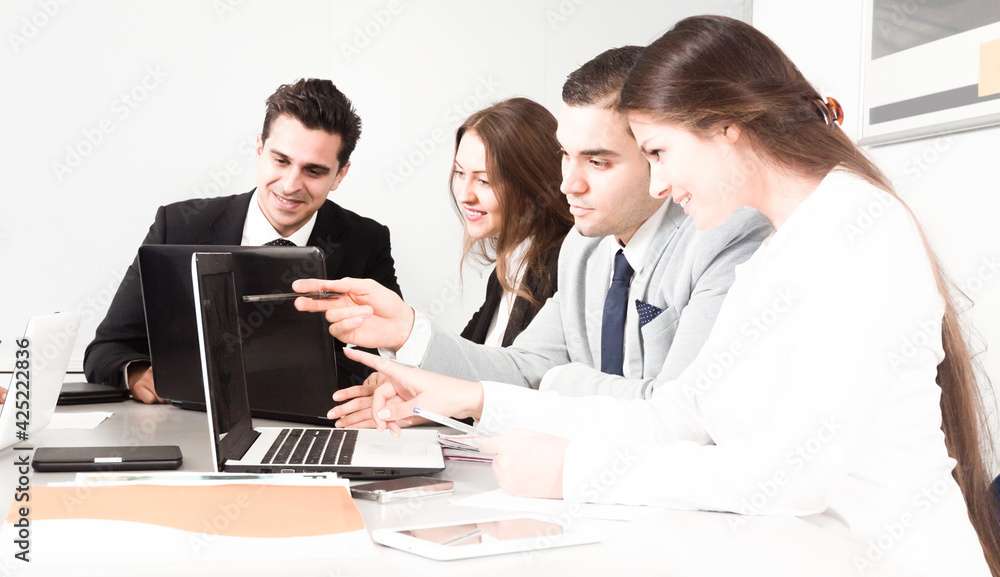 colleagues in negotiations in conference room colleagues in negotiations in conference room