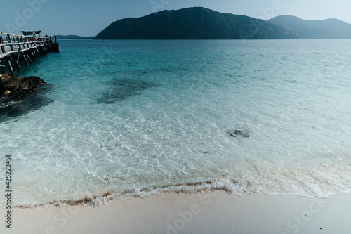 beautiful soft wave clear blue transparency sea ocean water and rocks at the bottom of the tropical paradise beach coast summer sea view at koh kham Samae SanIsland, Sattahip, Chonburi, Thailand