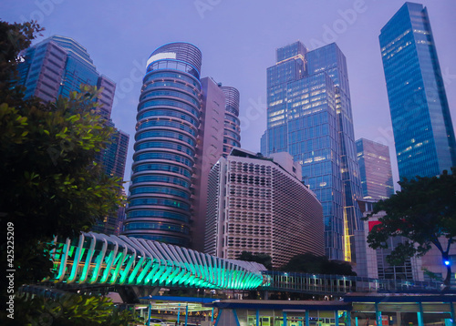 jakarta city downtown modern buildings traffic road evening