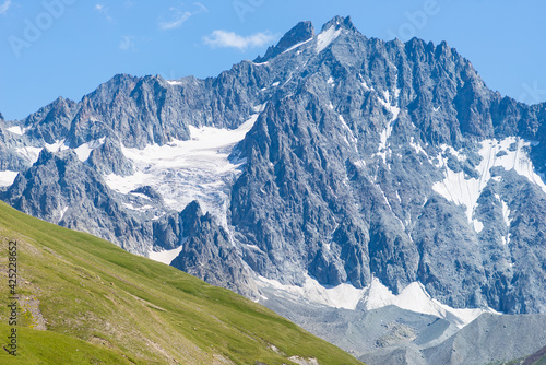 Mountain landscape on the french Alps, Massif des Ecrins. Scenic rocky mountains at high altitude with glacier