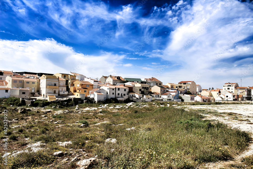 Obraz premium Views of the Peniche village and wild Atlantic Ocean with beautiful cliffs