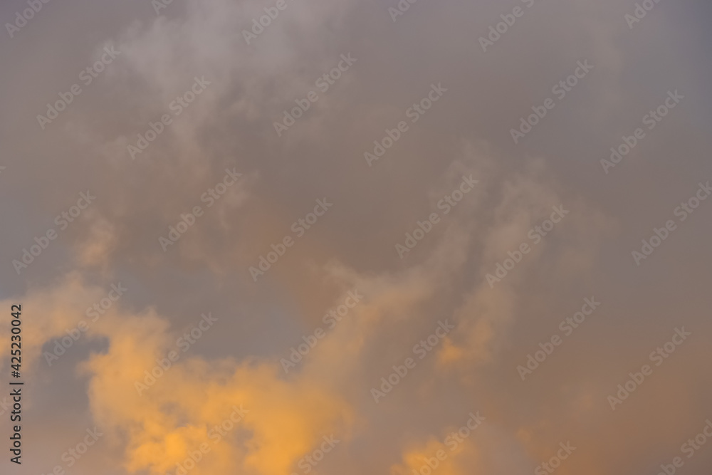 Yellow clouds during sunset.