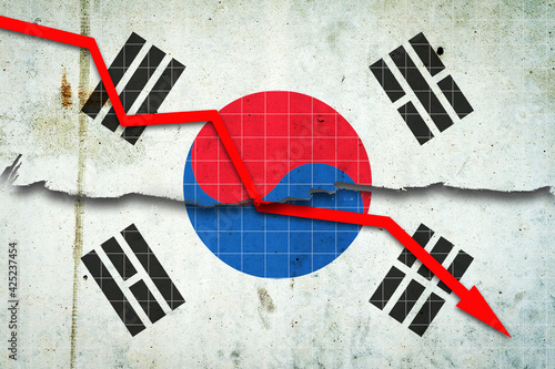 Fall of the Korean Economy. Recession graph with a red arrow on the Korea flag. Economic decline. Decline in the economy of stock trading. Downward trends in the economy.