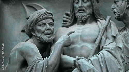 traitor Judas points to Jesus Roman governor photo