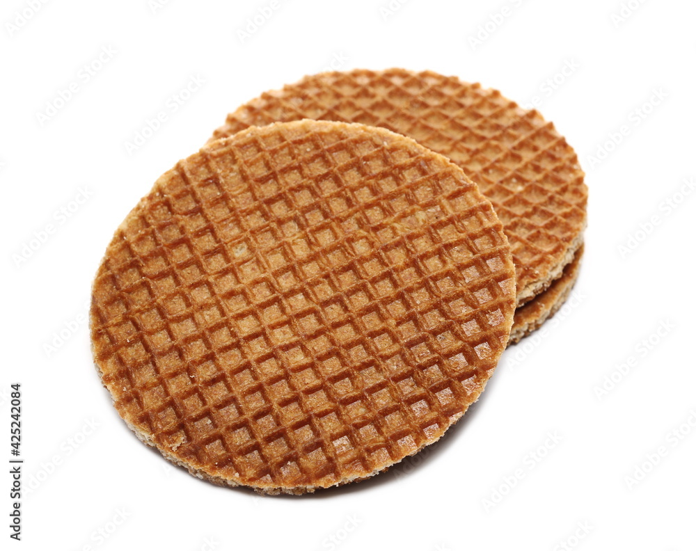 Dutch waffles with honey isolated on white background Dutch waffles with honey isolated on white background