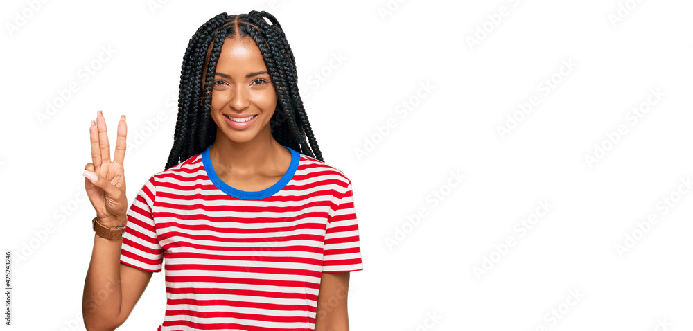 Beautiful hispanic woman wearing casual clothes showing and pointing up with fingers number three while smiling confident and happy. Beautiful hispanic woman wearing casual clothes showing and pointing up with fingers number three while smiling confident and happy.