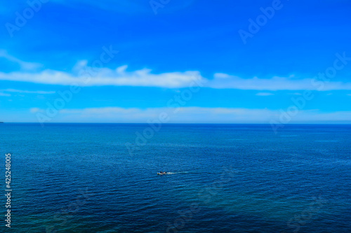 Beautiful view of a wooden boat on open Mediterranean sea  © Hamdi Bendali