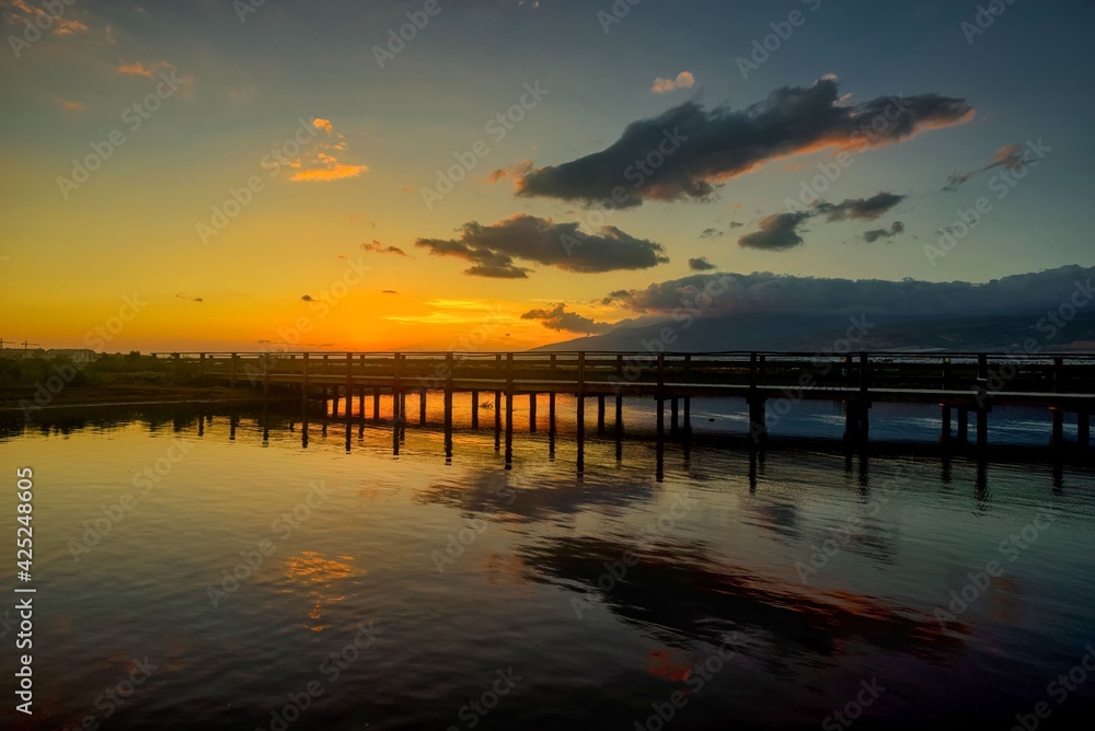 sunset walkway landscape with reflection in the water sunset walkway landscape with reflection in the water