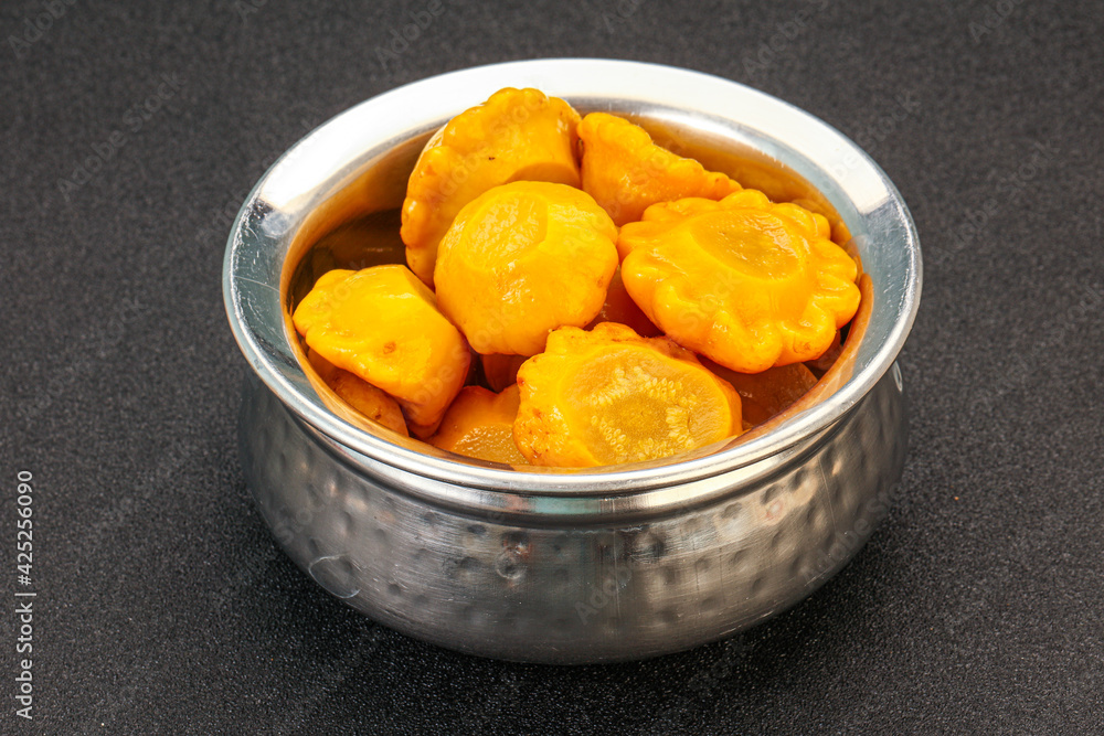Marinated yellow patisson in the bowl Marinated yellow patisson in the bowl