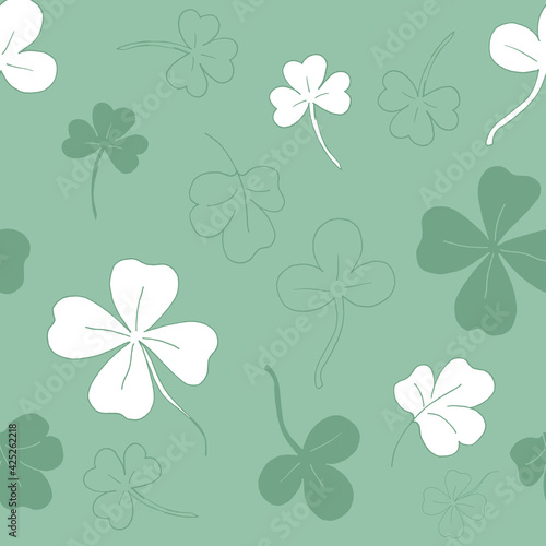 Seamless pattern with clover. The leaves of the clover. Light green seamless pattern. Vector illustration. Stock vector. 