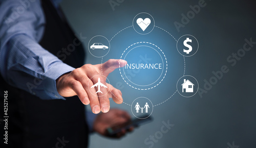 man holding phone with insurance icon