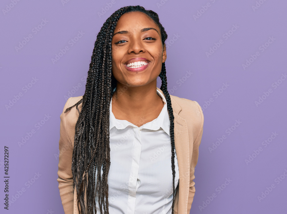 African american woman wearing business jacket with a happy and cool smile on face. lucky person. African american woman wearing business jacket with a happy and cool smile on face. lucky person.