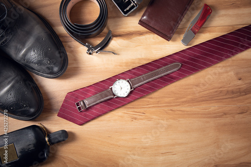 men accessories on the wooden table