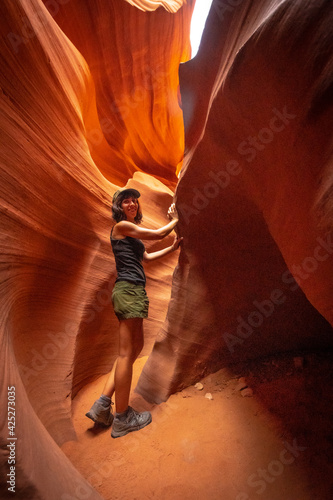 A young woman on the Lower Antelope Arizona trail. USA