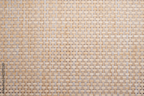 Wicker background in warm beige colors