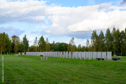 Mass graves and an alley of steles with the names of the buried at the German military cemetery at the Memorial complex "Peace Park", Rzhev, Tver region, Russian Federation, September 19, 2020