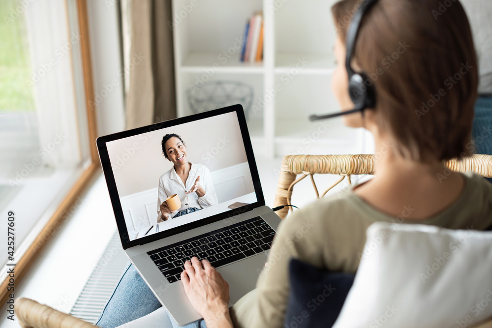 Meeting online. Woman having discussion or web conference chat. Work or study from home, freelance, online video conferencing, web chat meeting, distance education concept Meeting online. Woman having discussion or web conference chat. Work or study from home, freelance, online video conferencing, web chat meeting, distance education concept