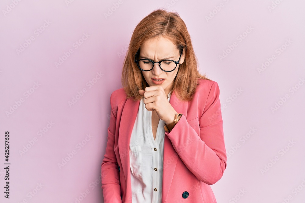 Young caucasian woman wearing business style and glasses feeling unwell and coughing as symptom for cold or bronchitis. health care concept.