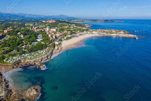 Comillas town coast on sunny day aerial view, Cantabria, Spain. © David
