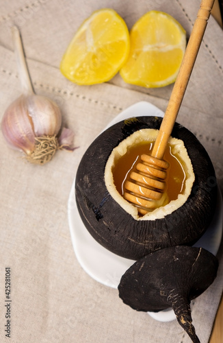 Black radish with honey.Natural honey cough syrup . photo