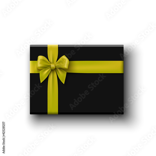 Black gift box with yellow bow on white background. Package with ribbon. Vector illustration.