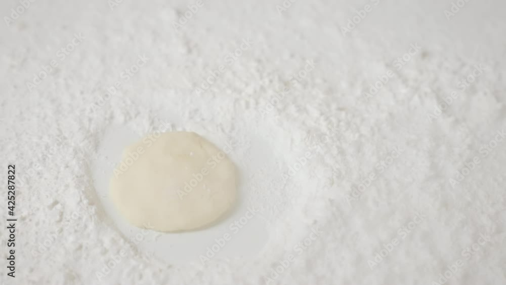 Flour drop on the table with for making various desserts. Flour drop on the table with for making various desserts.