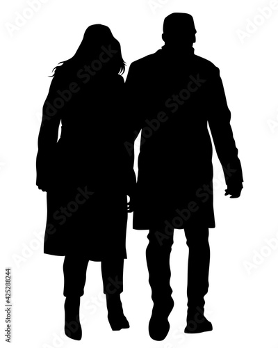 Young man and woman walking down the street. Isolated silhouette on a white background