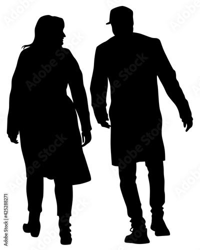 Young man and woman walking down the street. Isolated silhouette on a white background