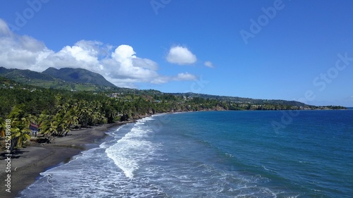 Black sand beach in Guadeloupe aerial view