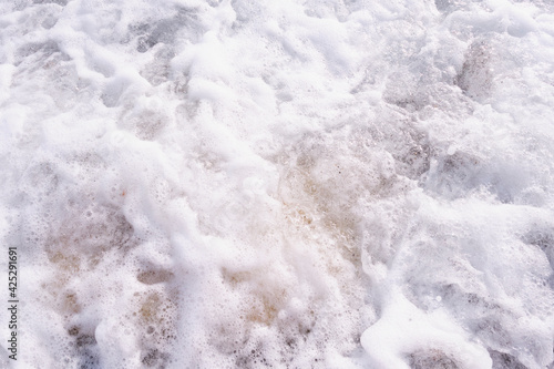 Sea white foam texture as abstract background