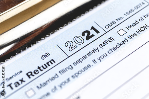 Tax time 2021 with 1040 individual tax form close-up