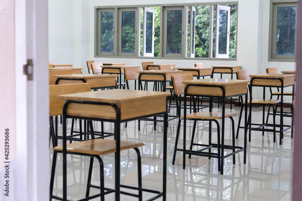 School empty classroom no childrens when COVID-19 disease outbreak and closed quarantine, no pupils in school and student study at home. Education learning problem in future and new normal life