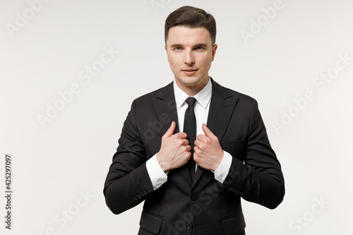 Young confident caucasian successful employee business corporate lawyer man 20s in classic formal black grey suit shirt tie work in office correct tuxedo isolated on white background studio portrait